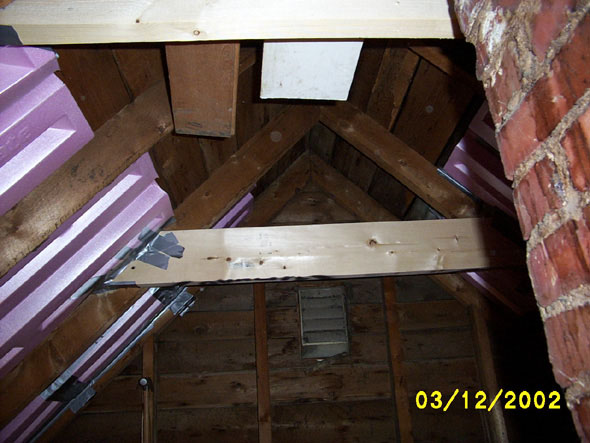 The crossbeam on the far south side is a 2x8 while the others are 2x6's because I want to drop the ceiling down a little further on the far south side so that the vent louvre will be fully within the (new) attic area.