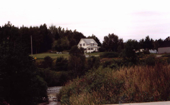 A house on a hill in Soldier Pond.