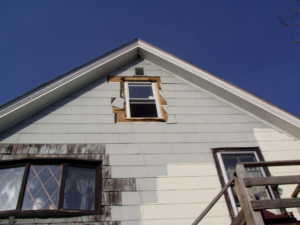 As you can see, the window is in place. It is a double-hung, tilt in window, which allows for easy cleaning. I don't think I've taken a picture, but we've already replaced the existing attic window.