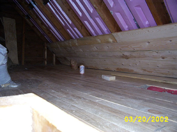 I've finished the first five boards along the west wall.