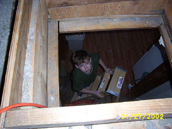 Just beyond Dennis is the upstairs kitchen.