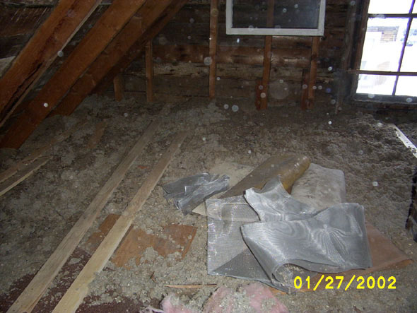 Before I swallowed my pride and accepted Denny's suggestion of starting in the middle of the room, I had put in a couple of lengths of floor along the west side.