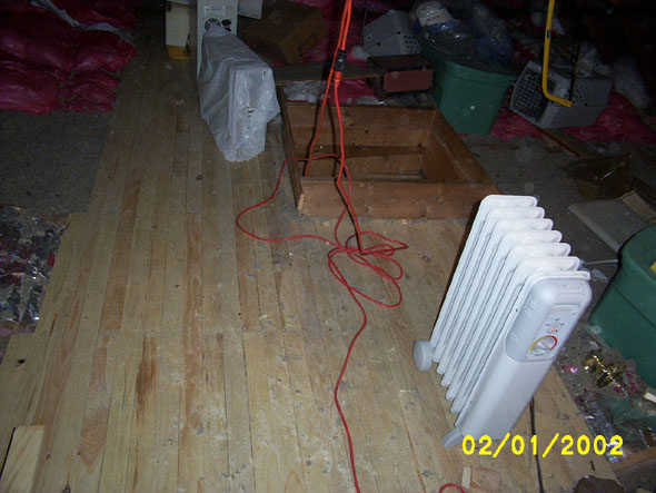 Still a lot of junk south of the entryway.  It has gotten too cold to work up here without a heater.  In Texas, this was the only  heater we needed for the entire house.