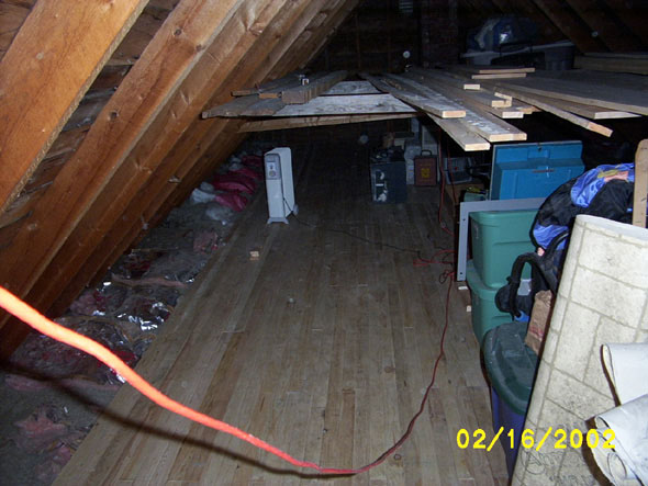 Over on the west side, still looking north.  I only have about two rows of floorboards to go,  not counting the wide ending board.