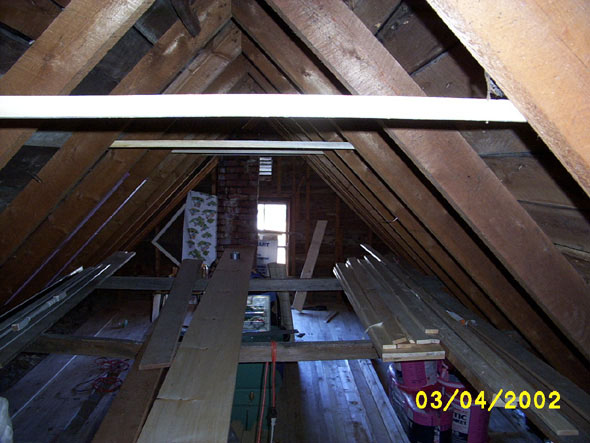 The perspective is better here, and you can see that I wasn't lying when I said that they were straight and level.  All the positioning boards are in place, and I'm ready to place the crossbeams.