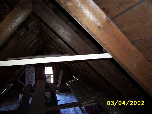 These are not the crossbeams, by the way.  They are simply temporary positioning strips, easy to place, and which I can butt the actual 2x6 crossbeams up against.  Oh, and it's the perspective -- really, they are fairly even.
