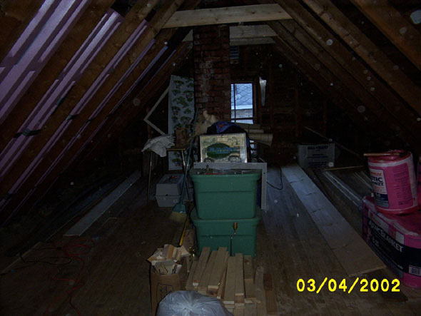 I've removed a couple of the old crossbeams.  It's nice to be able to walk around without having to duck under them all the time -- or worse, hit my head.