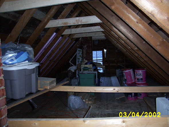 For now, I've left the two crossbeams on the south side.  I use one of them for support when I lift myself through the entryway, so I'll probably leave that one there until I get a stairway in.