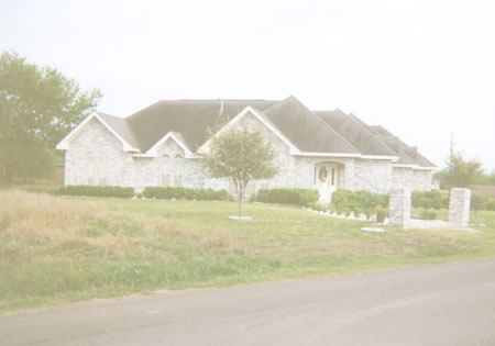 Some pretty nice houses are starting to sprout up along M 6-W, north of Hwy 107.