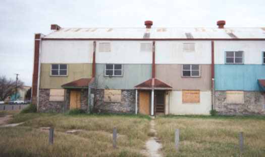 The Cotton Gin Apartments were condemned last year, and may or may not reopen.  Condemned last year, the Cotton Gin Apartments now provide a playground for the citys street gangs.