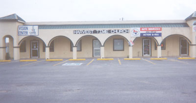 The Harvest Time Church is in the same mini-mall as Jesses Deli, Action Auto Insurance, and the Vision Eye Care Center.