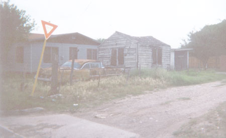 It looks like this guy abandoned his car and his house at the same time.  Located on W David Ybarra and Bowie, this makes for an interesting picture.