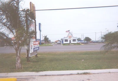 Across the highway from the Harvest Time Church is the local Whataburger.