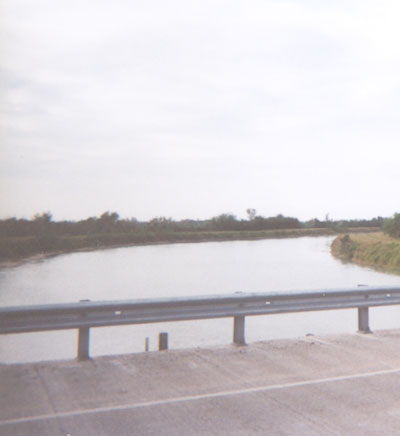 To the left is an irrigation canal that crosses FM-2629 west of FM-1925.