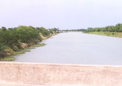 Right and below -- a view of the canal that crosses FM-1422 between Marro Road and FM-1015.