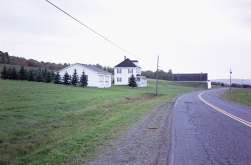 I lost my notes on this roll of film, so I'm not sure, but I think this is a house on Strip Road in New Canada, with a barn in the background.