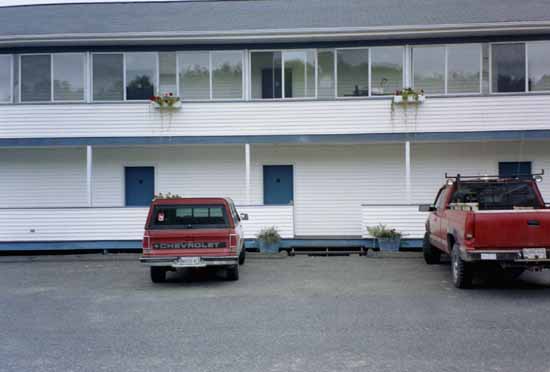 The red Chevrolet S-10 PU parked outside of Room 12 is mine.