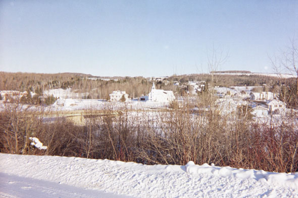 St. Joseph's Parish and much of the town of Soldier Pond can be seen in the background in this photo, taken from the other side of the Fish River.